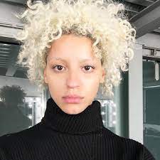 Bangs that end with light blonde. Blonde Kinky Curly Hair Tips By Model Nejilka