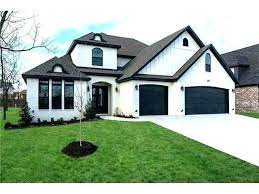 Light green door on white painted house with images. Pin By Sydney Zabarauskas On New Home New Projects Black House Exterior White Exterior Houses House Exterior
