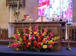 Church altars can be decorated for a wedding using fresh flowers, silk flowers or an array of candles. Church Wedding Decorations Altar Flowers Church Flower Arrangements Alter Flowers Altar Flowers
