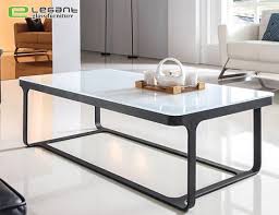 This unique and beautiful coffee table is made of steel and iron with a lava stone top. China Stone Painted Tempered Glass Center Table With Iron Base China Coffee Table Glass Table