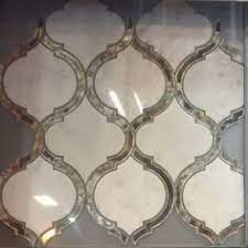 Arabesque tile backsplashes are becoming a popular trend for kitchens and bathroom wall tiles. Image Result For Arabesque Mirror Tiles Antique Mirror Tiles Wall Tiles Stone Tile Wall