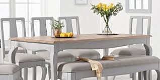 Made in malaysia, the bayhills includes four dining chairs and one table constructed from sturdy wood finished in a warm walnut brown. Solid Oak Dining Room Furniture Oak Furniture Superstore