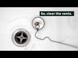 bathtub drain gurgles when toilet is