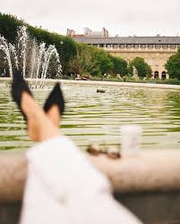 my name is anna on instagram nothing beats the feeling of laying on a green chair in jardin du palais royal with coffee