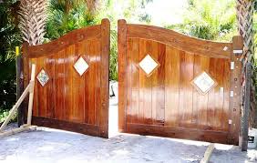 Made completely from wood with no metal frame, this wood sliding gate is attractive and affordable. Preventing Sagging In A Large Driveway Gate