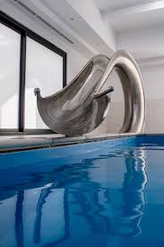 It Is Made From Sheets Of Stainless Steel That Have Been Hammered Into Shape And Welded Together To Form Swimming Pools Hotel Swimming Pool Cool Swimming Pools