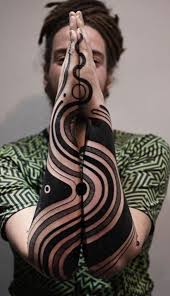 This tattoo, reminiscent of a spirograph creation, or spokes on a bicycle wheel, depicts a series of lines around a central hub, the tattoo three succeeding directional arrows are rendered in black ink running along the outside of the wearer's forearm in this simple tattoo. 30 Unique Forearm Tattoos For Men Women You Ll Love These