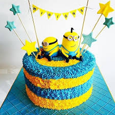 We sure enjoy bringing smiles and good energy to our customers' faces. Minions Themed Colorful Buttercream Topped Chocolate Sponge Cake Awesome Cakestotaste From Minion Birthday Cake Minion Birthday Party Toddler Birthday Cakes