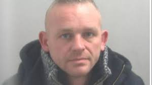 Essex Police appeal to find wanted man with distinctive Batman tattoo