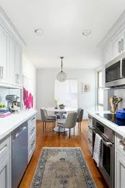 Keep everything organized with our dining room storage options, including buffets, sideboards, and credenzas—and top off good times with one of our gorgeous bar cabinets. Galley Style Kitchen Design With Dining Table And Chairs Transitional Kitchen