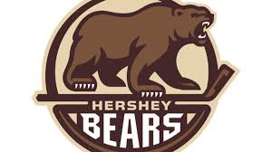 The primary logo is a medium brown bear, outlined in dark brown, roaring while standing on a hockey stick centered above the hershey bears wordmark. Ahl Logo Ranking No 1 Hershey Bears The Hockey News On Sports Illustrated