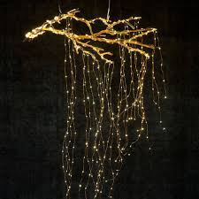 28 Breathtaking Ways To Decorate With Christmas Tree Lights Branch Decor Christmas Tree Lighting Autumn Lights
