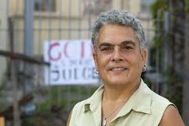 Fighting the church with sticks, sawhorses and crumbled brick