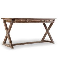 Over time, teak weathers to a gray patina that some may not find appealing. Bennett X Base Distressed Wood Writing Desk