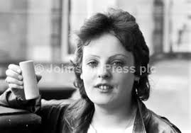 22643126-John Downes sometimes referred to as Sean Downes was killed by an  RUC plastic bullet during an anti-internment rally in Belfast, 12 August  1984. His widow Brenda Downes shown holding a plast -