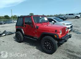 Image result for Flame Red 2005 Jeep