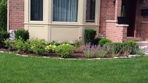 For added comfort, a 4″ thick cushion with gold patterns was placed on the surface. Pin By Lynn Leder On Landscape Ideas Bay Window Landscaping Front Yard Landscaping Garden Windows