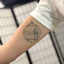 Rita Ora S Healed Bird Cage Tattoo On The Inner Arm