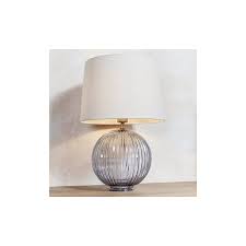 It has a linen fabric empire shaped lamp shade in white. Endon Lighting 82114 Jemma Single Light Grey Glass Table Lamp Base Castlegate Lights