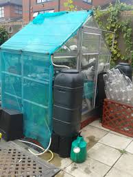 This post may contain affiliate links. Water Butt On Greenhouse In Design And Construction Page 1 Of 1