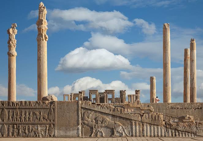 The surviving columns and bas-reliefs of Persepolis, burned by Alexander the Great, AI generated