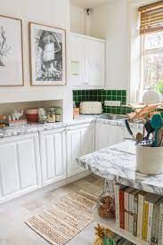 How To Apply Contact Paper To Your Kitchen Counters An Edited Lifestyle Rental Kitchen Makeover Kitchen Cabinets Cover Rental Kitchen