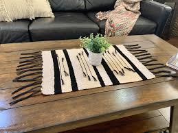 If you prefer clear glass, first cover the table's ugliness with a collage of photos, clip art or magazine cutouts, or wallpaper. Saori Style Table Runner Coffee Table Runner Plant Rug Etsy In 2021 Coffee Table Runner Coffee Table Cover Coffee Table