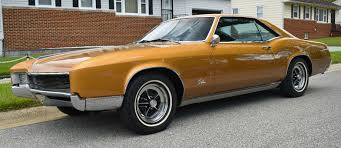 Image result for Riviera Champagne 1966 Buick