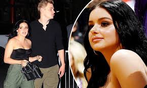 Ariel Winter stuns in strapless top with cargo pants with beau Levi Meaden  at LA Lakers game