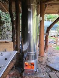 During Construction The Wood Fired Water Heater 150 Litres Of Glorious Hot Water Immediately After Its Installation Water Heater Diy Diy Heater Wood Heater