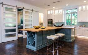 Trim, garage doors & columns: Luxury Interior Design For New Construction Barbara Gilbert Interiors
