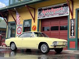Image result for Sierra Tan 1965 Corvair