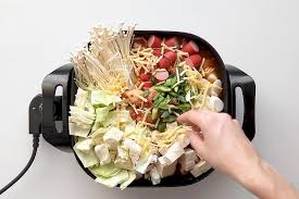 Flank steak sits overnight in a sweet marinade before being grilled to perfection. Easy Korean Army Stew Budae Jjigae Wandercooks