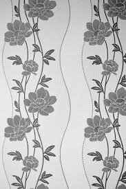 Display this artwork in your living area above a vintage camelback sofa and a faux fur rug to complement the wall decor. Hd Wallpaper Gray And White Floral Print Wall Decor Black And White Texture Wallpaper Flare
