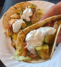 Place fish into lettuce leaves, lay avocado slices up against it, and add salsa and radishes. Fish Taco White Sauce Fish Taco White Sauce White Sauce Recipes Paleo Fish Tacos