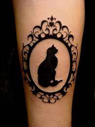 Black Cat Tattoo Design Ideas With Meaning January 2021 Framed Tattoo Cameo Tattoo Cat Tattoo Designs