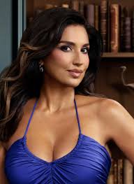 Rhoc: Gina Kirschenheiter is feeling herself in deep plunging top and  leather shorts