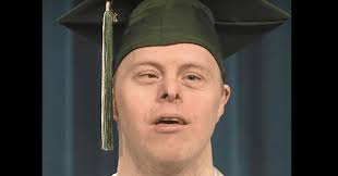 Man with Down Syndrome makes history as he becomes first to graduate from  his college with his condition