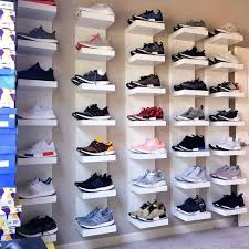 Pin By Jonathan Carrizales On Shoes Shoe Store Design Shoe Shelves Shoe Wall