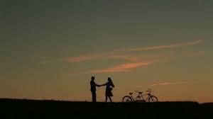 Download now pelukan gif gambar animasi animasi bergerak 100 gratis. Romantic Couple With Tandem Bicycle Softly Kissing While Sunset Summer Nature Background With Beautiful Clouds In The Sky Close Up Video By C Imidglviv Gmail Com Stock Footage 98490436