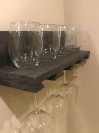A wine glass is a type of glass that is used to drink and taste wine. Shelf With Wine Glass Storage Glass Storage Wine Glass Storage Wine Glass Shelf