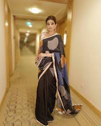 Her hairstyle enhances the overall outfit. Actress Priyamani Hot Photos In Saree Actress Album