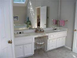 Consider placing a makeup table in an unused nook. Bathroom Vanity With Makeup Area Youtube