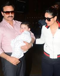 New Pics Of Taimur Sleeping In Daddy Saif S Arms Before Flying To Alps Are Cuteness Personified Kareena Kapoor Khan Kareena Kapoor Baby Kareena Kapoor