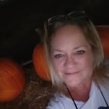 What causes grey tank water to overflow into the camper and how to prevent  it?