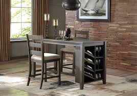 Each piece has a steel frame with two crossbars near the bottom of the table and similar footrests on all sides of the counter stools. Rokane 3pc Counter Height Dining Set