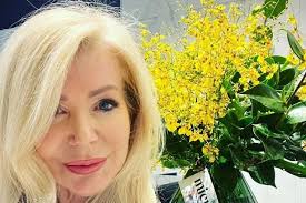 Fit gran, 64, unleashes hot body as she slips into green bikini to flex  muscles