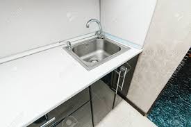the photo of a white clean sink with