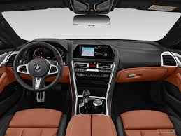 The interior features include tacho meter, electronic multi tripmeter, leather seats, leather steering wheel, digital clock, digital odometer. 2021 Bmw 8 Series 262 Interior Photos U S News World Report