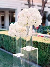 Modern Wedding Ceremony Decor White Hydrangea And Rose Arrangements Modern Wedding Ceremony Wedding Ceremony Decorations Wedding Ceremony Floral Arrangements